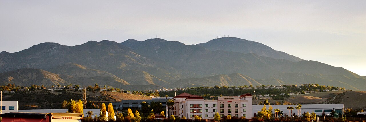Saddleback mountains viewed from Lake Forest with Foothill Ranch buildings and Portola Hills homes